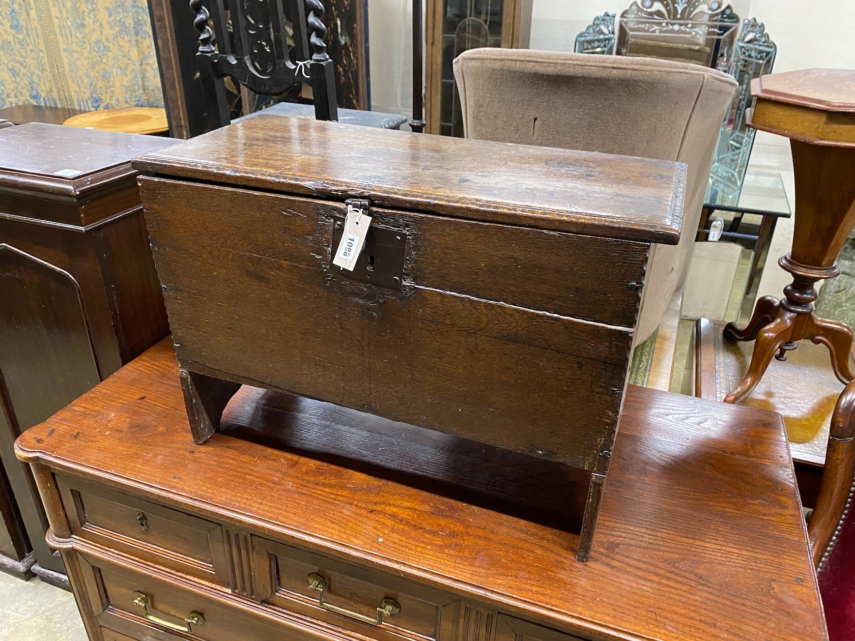 A late 17th century oak six plank coffer, length 73cm, depth 35cm, height 50cm